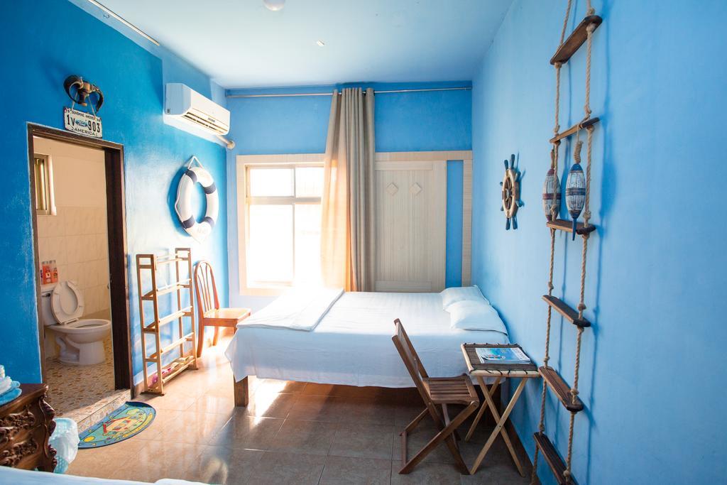 G.T. Guest House Garapan Ruang foto