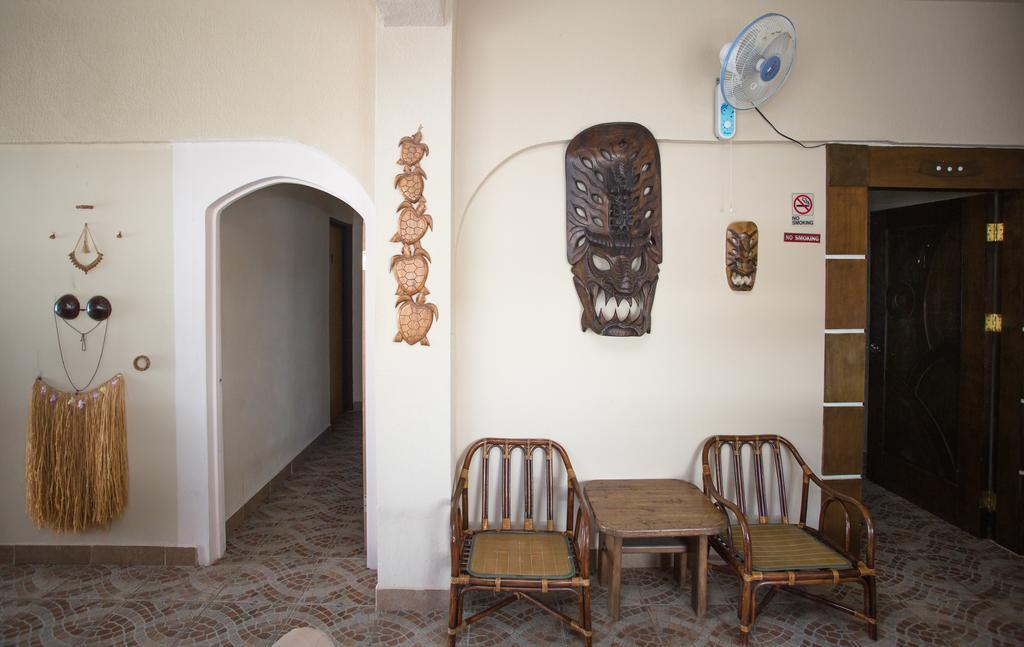G.T. Guest House Garapan Bagian luar foto